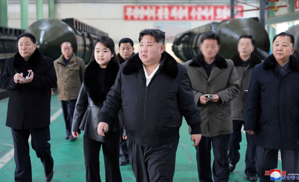 Kim Jong Un  inspecting a military vehicle production plant with his daughter Ju Ae