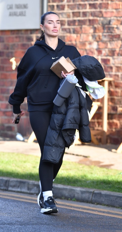 She hid her six-month baby bump with an oversize Nike hoodie