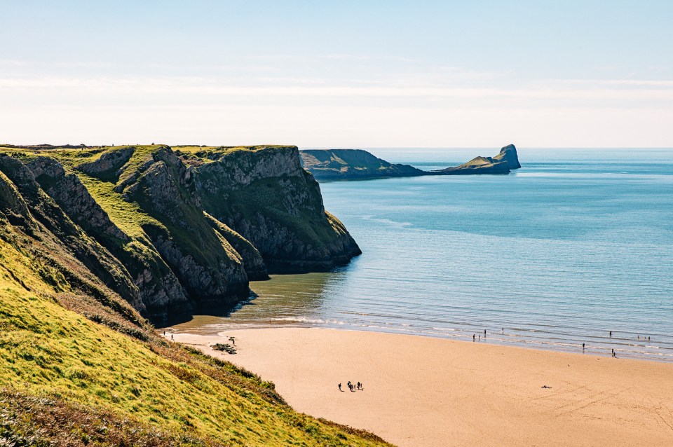 Rhossili Bay Beach in the Gower Peninsula is a must visit