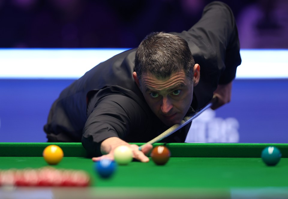 Ronnie O’Sullivan pictured playing in his first-round match against Ding Junhui during day two of the Masters Snooker 2024 at Alexandra Palace