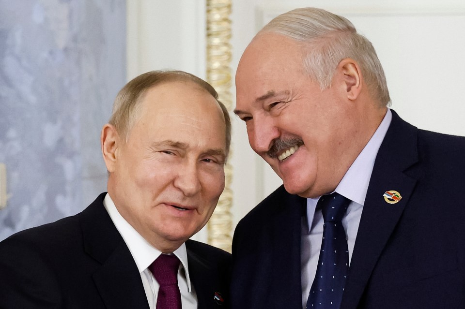 Putin laughing with Belarus President Alexander Lukashenko after their meeting about the two countries and their strong alliance