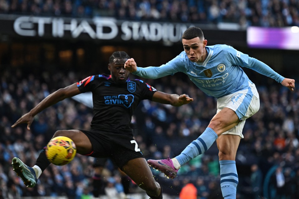 Phil Foden cracked Man city’s 33rd minute opener on his way to a double