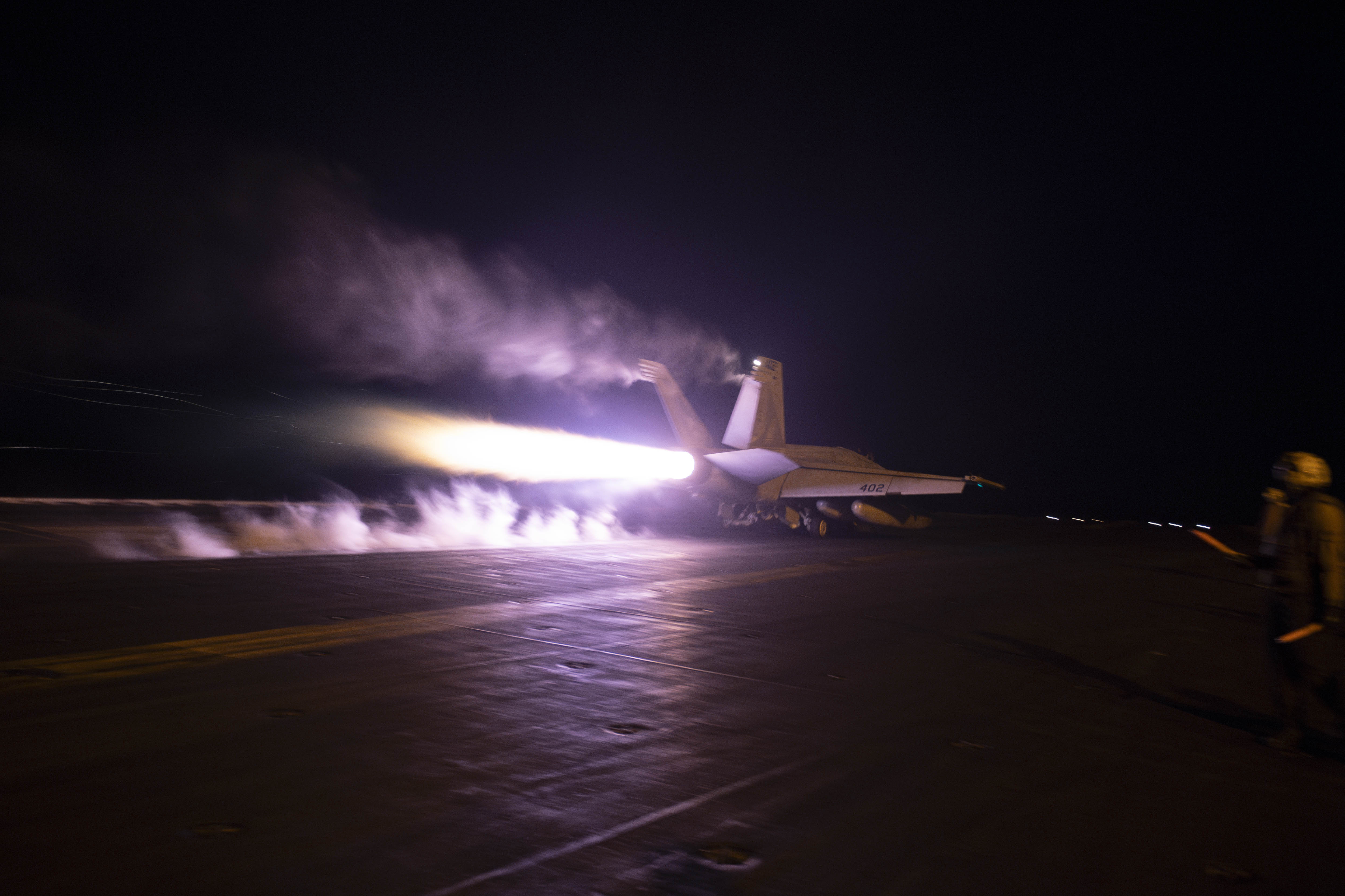 An aircraft launching from USS Dwight D. Eisenhower on January 22 before the US and US led further strikes on Houthi rebel strongholds