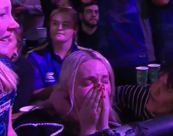 Kayley Jones collapsed in tears as she watched boyfriend Luke Humphries clinch glory