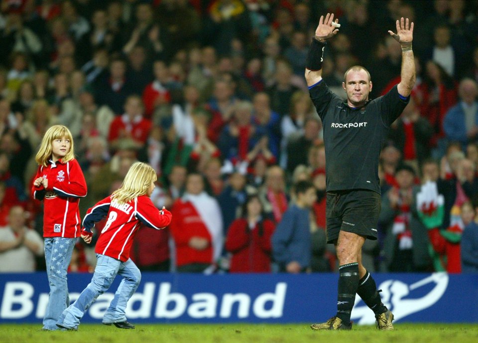 Daughters Samantha and Lucy on the pitch with the Welsh icon