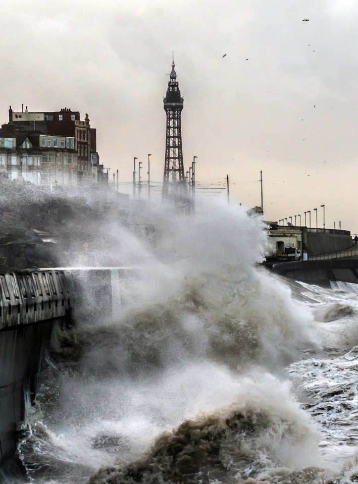 Waves batter the sea front in Blackpool