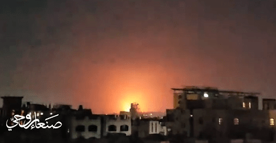 Footage shows the blasts lighting up the sky with an amber glow