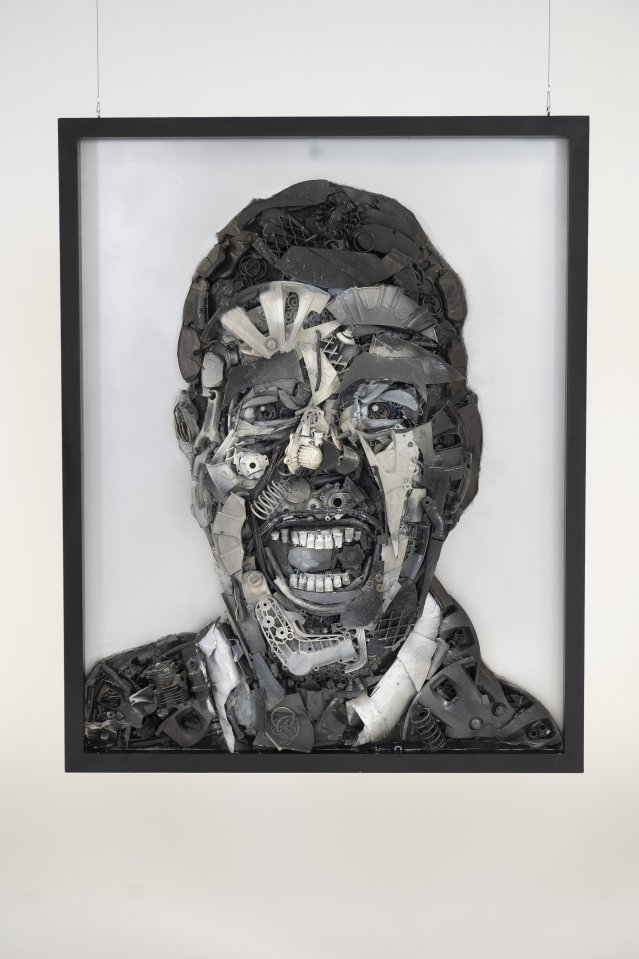 Chris Kamara made entirely out of scrapped car parts