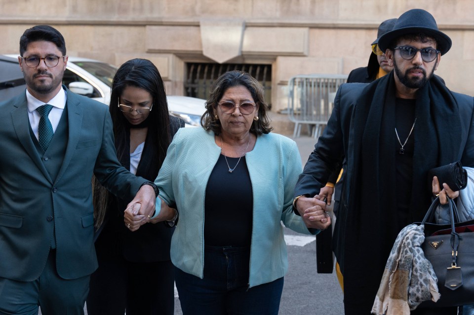 Dani Alves’ mother, Lucia Alves leaves the courthouse with family members on Monday