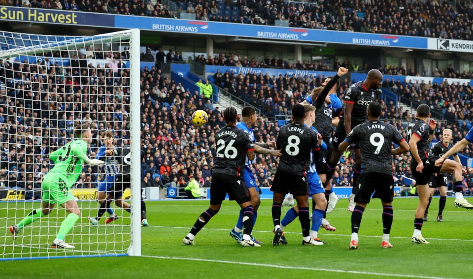 Lewis Dunk rises above Palace's static defence in the opening two minutes