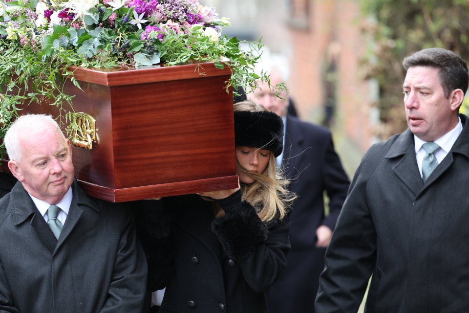 Derek and Kate's daughter Darcey, 17, bravely carries the coffin as a pallbearer to the church