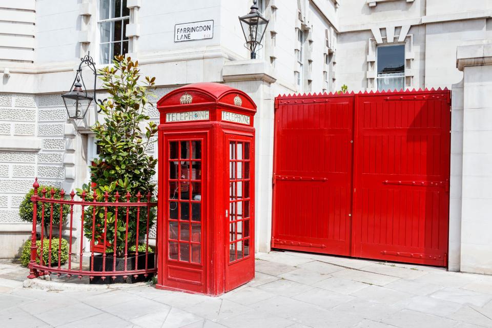 Red telephone boxes are prime photo opportunities for tourists coming to the UK