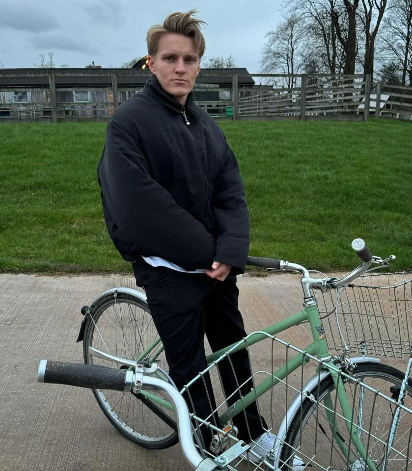 The Arsenal man also enjoyed a bike ride through a park