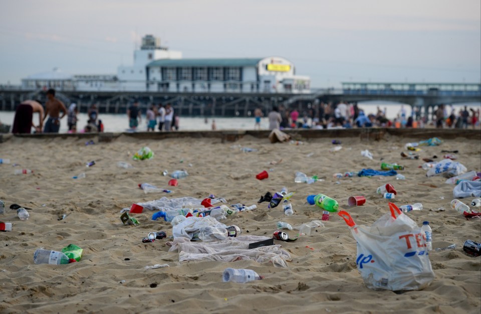 Rubbish litters the beach after many visitors leave Bournemouth