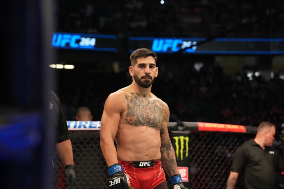 LAS VEGAS, NV - JULY 10: (R-L) Ilia Topuria celebrates his victory over Ryan Hall in their UFC Featherweight bout during UFC 264 at T-Mobile Arena on July 10, 2021, in Las Vegas, Nevada, United States. (Photo by Louis Grasse/PxImages/Icon Sportswire via Getty Images)