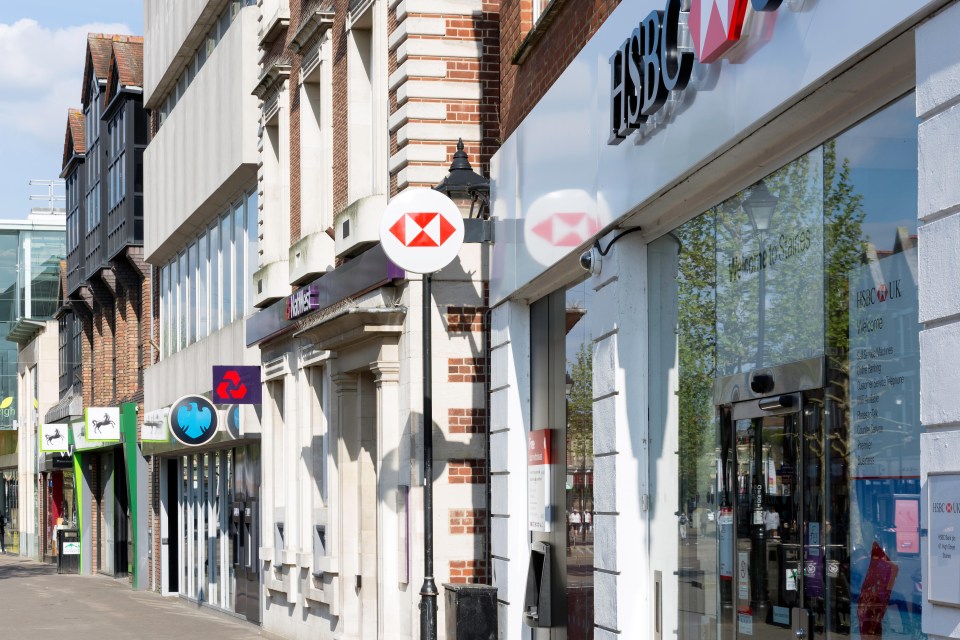 J2R61P Row of high street banks (Lloyds, Barclays, Nat West & HSBC), High Street, Staines-upon-Thames, Surrey, England, United Kingdom