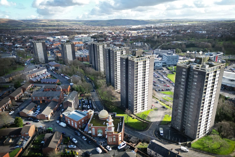 An aerial view shows the residential tower blocks known as the 'Seven Sisters' in Rochdale in Greater Manchester, north-west England on February 12, 2024. The opposition Labour Party faces criticism from their opponents after standing by its Rochdale by-election candidate Azhar Ali, even after he claimed that Israel allowed Hamas to carry out its October 7 attacks to give them an excuse to invade Gaza. (Photo by Paul ELLIS / AFP) (Photo by PAUL ELLIS/AFP via Getty Images)