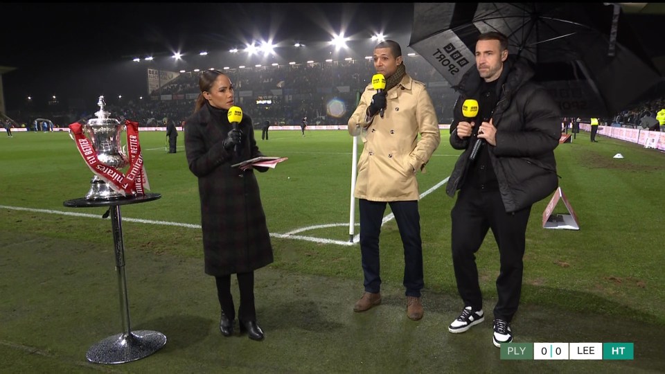 The former Arsenal and England defender ended up being drenched by rain