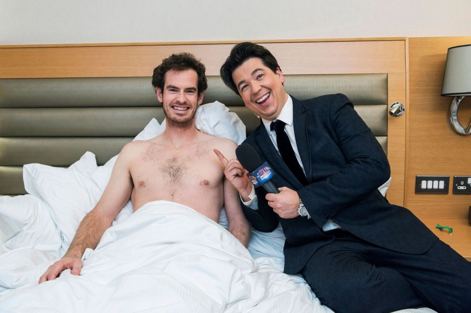 For use in UK, Ireland or Benelux countries only Undated BBC handout photo Andy Murray being woken up by Michael McIntyre for Sport Relief. PRESS ASSOCIATION Photo. Issue date: Sunday March 18, 2018. The comedian, 42, barged into Murray's hotel room as the twice Wimbledon tennis champion slept soundly. A shirtless Murray, 30, then sat up in bed to play Midnight Gameshow, for a sketch to air on BBC1. See PA story SHOWBIZ Murray. Photo credit should read: BBC/PA Wire NOTE TO EDITORS: Not for use more than 21 days after issue. You may use this picture without charge only for the purpose of publicising or reporting on current BBC programming, personnel or other BBC output or activity within 21 days of issue. Any use after that time MUST be cleared through BBC Picture Publicity. Please credit the image to the BBC and any named photographer or independent programme maker, as described in the caption.