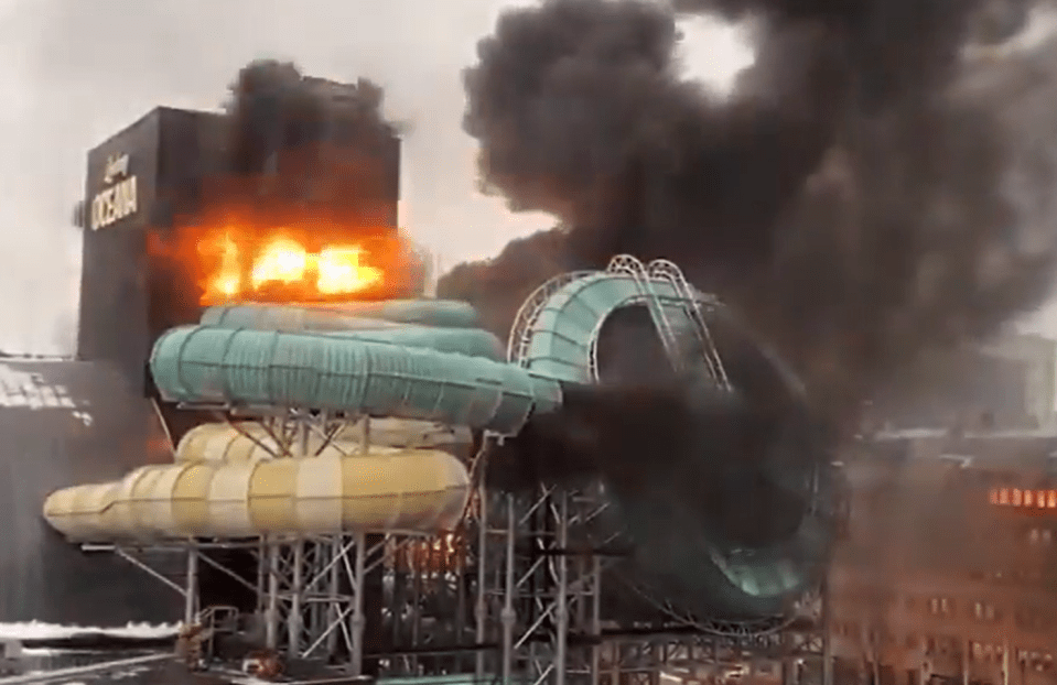 The moment the water slide exploded engulfing the attraction in flames