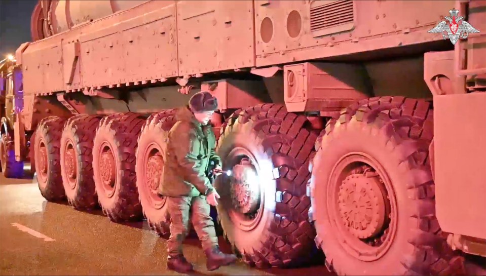 Yars missiles are seen mounted on massive truck carriers