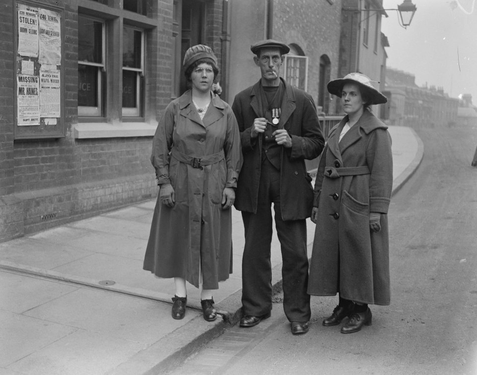 Rose Gooding, left, with her husband and her sister at court in 1921