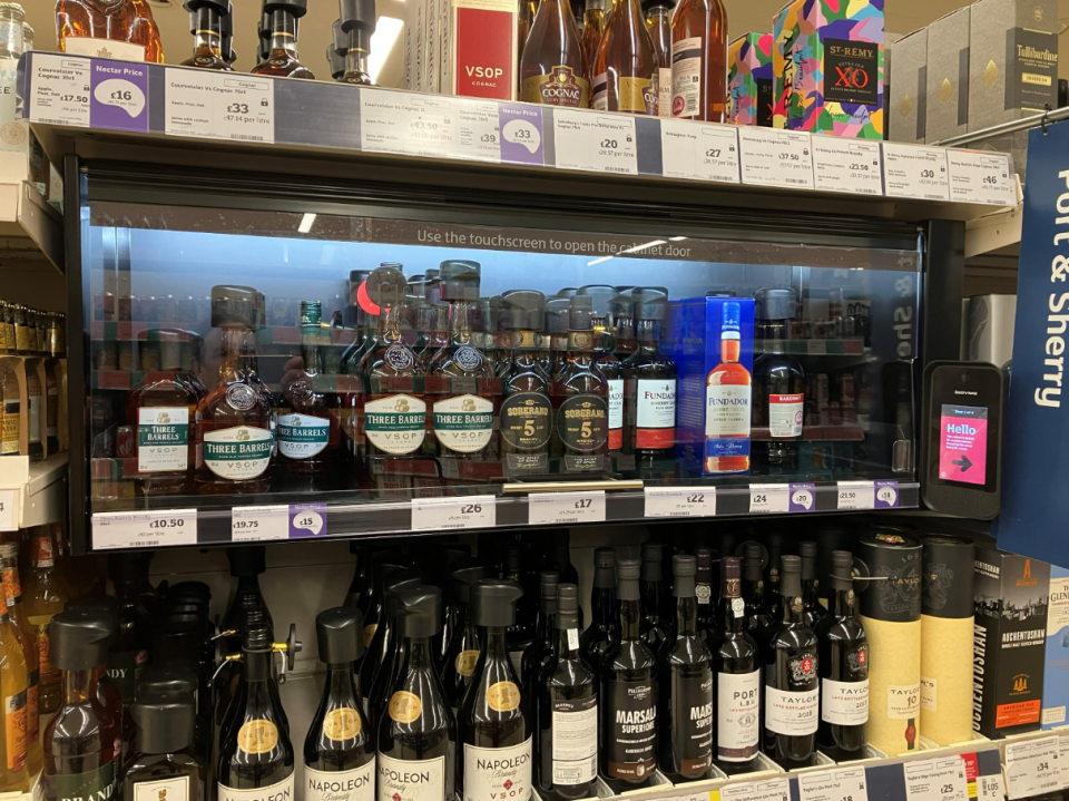 The giant retailer is trialling new ways to curve thefts at its booze isles