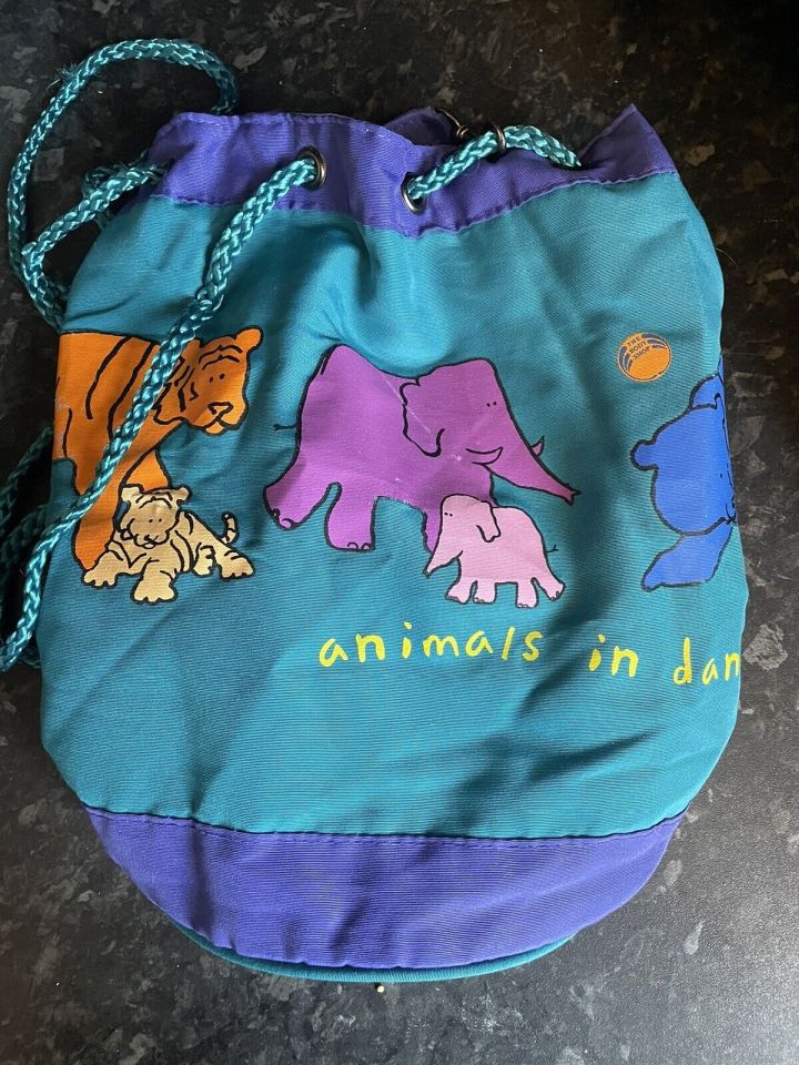 This colourful retro makeup bag emblazoned with the words 'animals in danger' is priced at £38.50