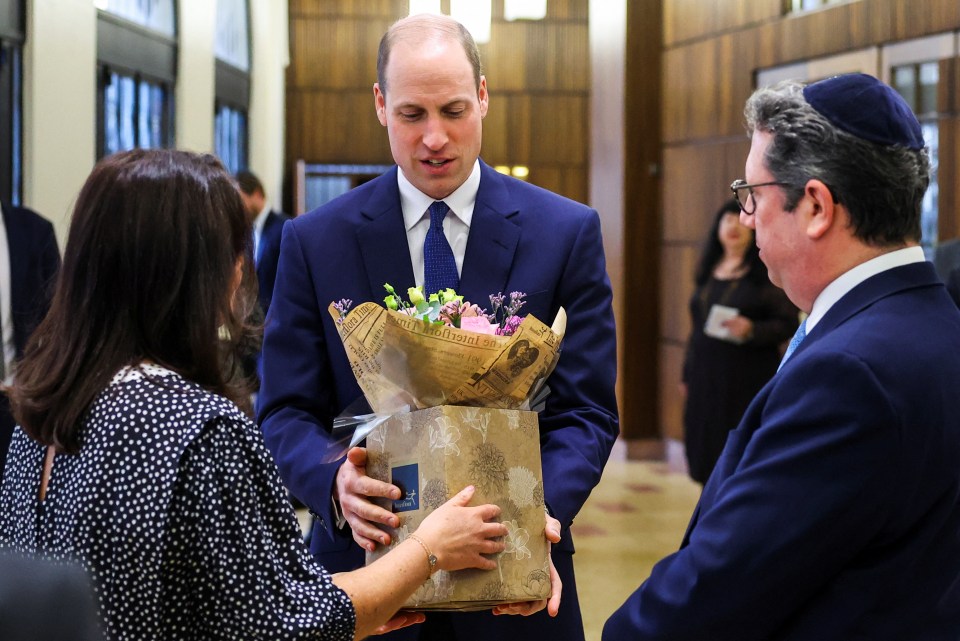 Prince William received a bouquet of flowers for his wife Catherine