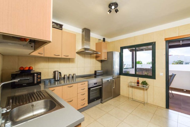 The villa comes complete with a spacious kitchen