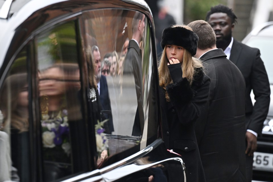 Darcey prepares to carry her father’s coffin as a pallbearer