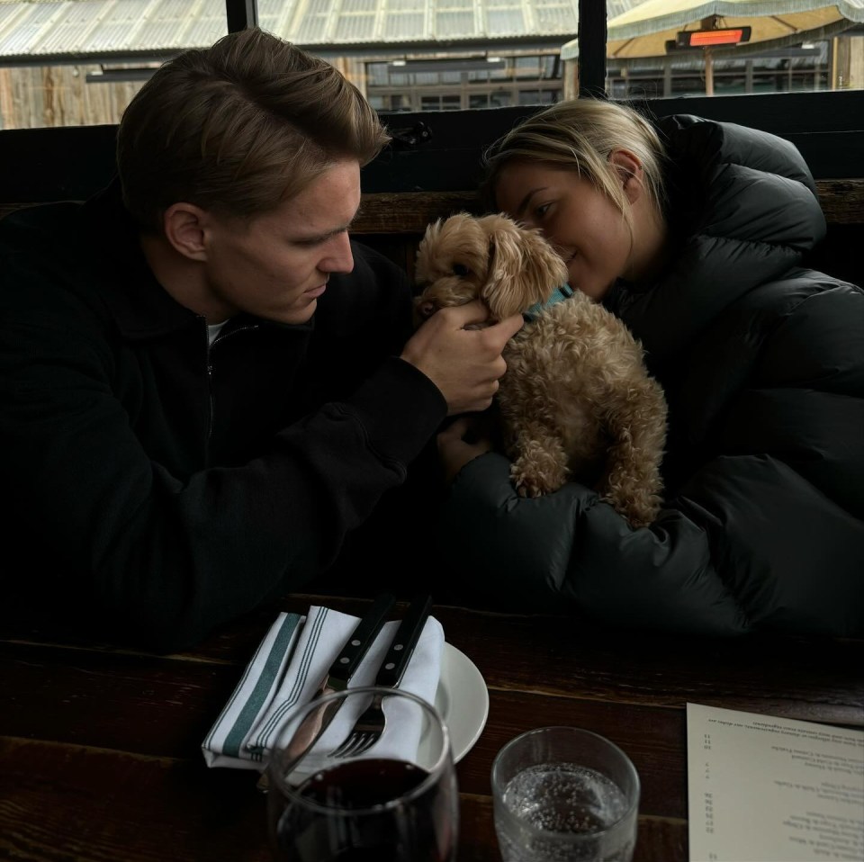 Martin Odegaard and girlfriend Helene Spilling posed with a puppy