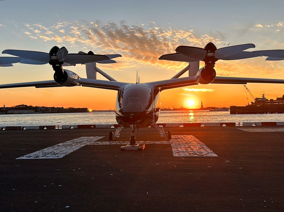 An electric air taxi by Joby sits at the Downtown Manhattan Heliport in New York City