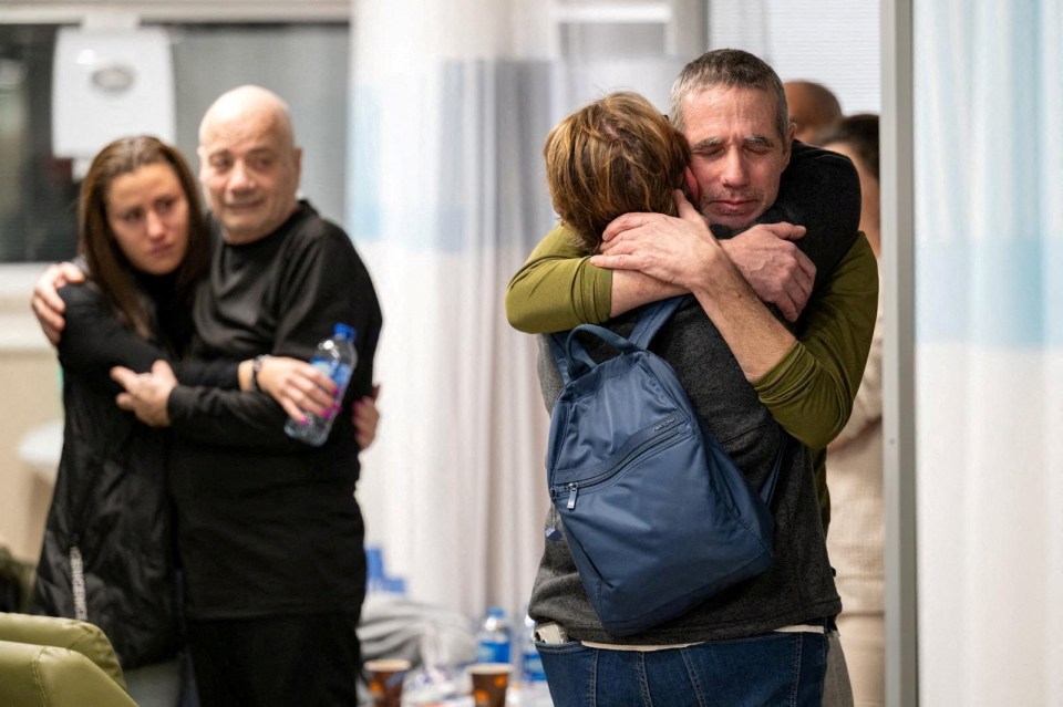 Simon Marman and Louis Har, 61 and 70, hugged their loved ones tightly as they were reunited after 128 days in captivity