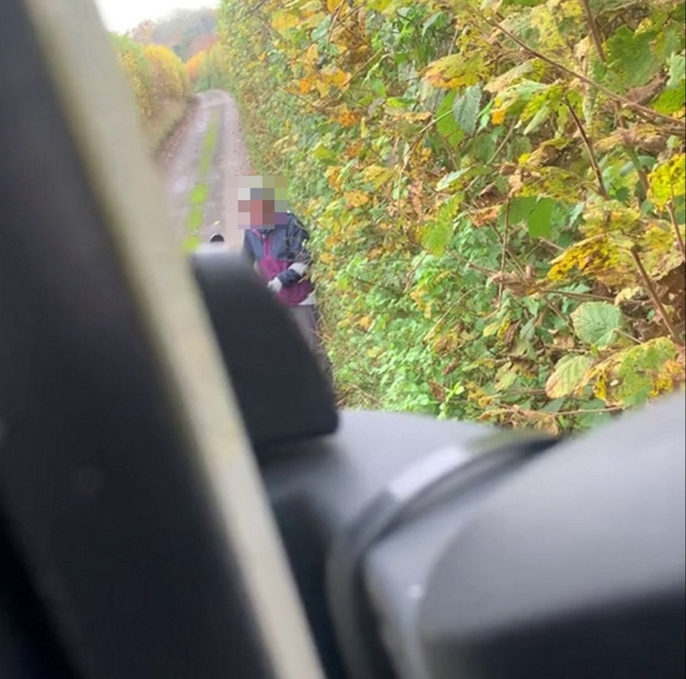 The clip left social media divided as the woman demanded that the 60ft HGV be reversed