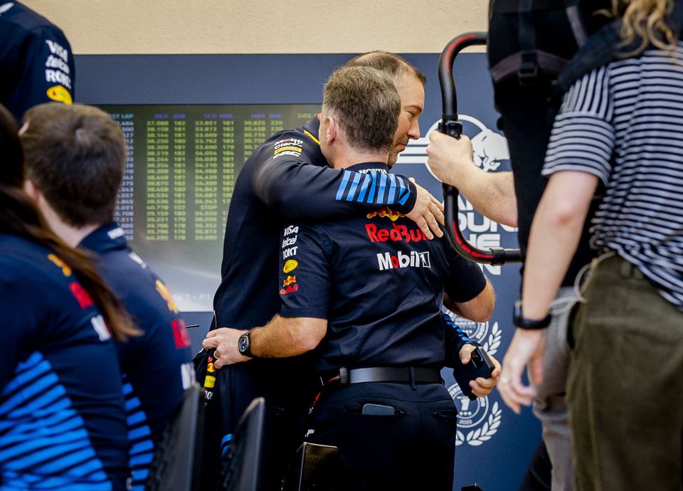 Horner pictured hugging a fellow team member