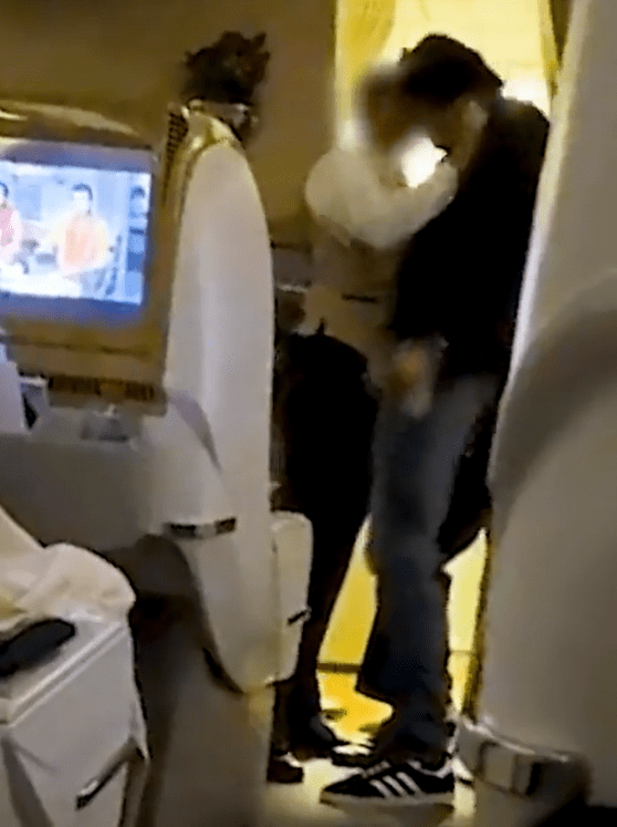 Shock footage shows the moment the passenger headbutted an air steward