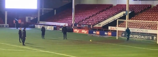 The ball struggled to role as refs conducted a pitch inspection