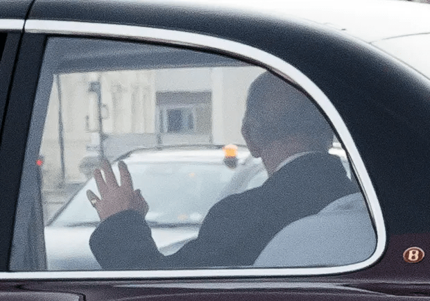 King Charles seen waving to the public as he is driven to Clarence House