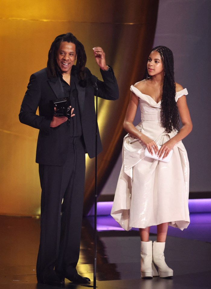 The whining Jay Z on stage at the Grammys, with daughter Blue Ivy, 12, at his side