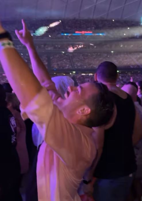 He shared a video of him dancing and singing in the rain