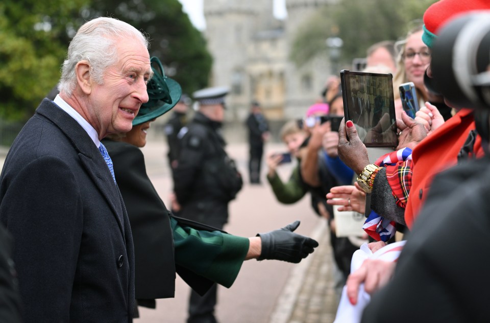 King Charles greeting the crowd at Windsor Castle on March 31, 2024