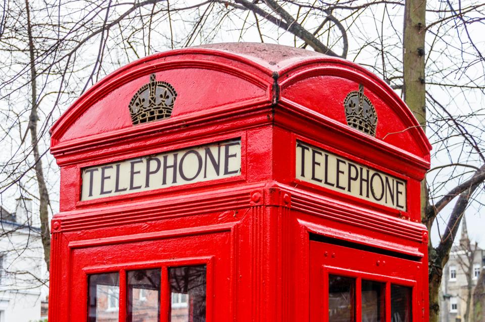 The iconic red telephone boxes were designed by Sir Giles Gilbert Scott