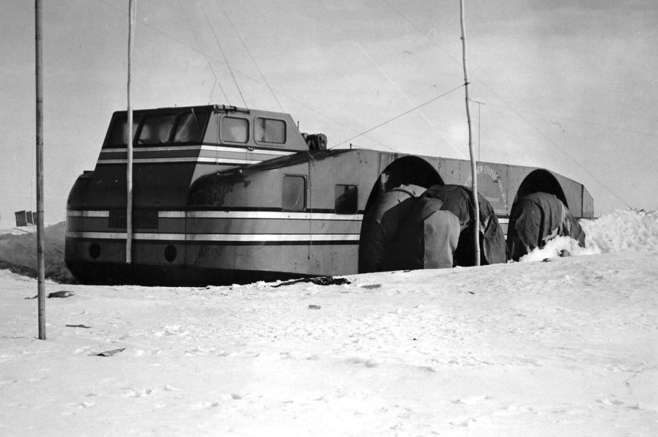 The Snow Cruiser covered in snow as it was abandoned