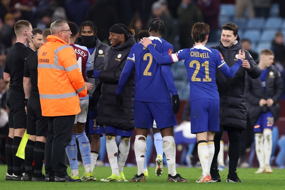 Mauricio Pochettino celebrates with his Chelsea players