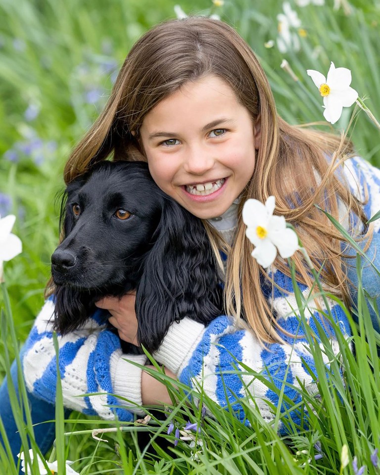 Kate has returned home to Adelaide Cottage, and reunited with her family, including her dog Orla (pictured with Princess Charlotte)