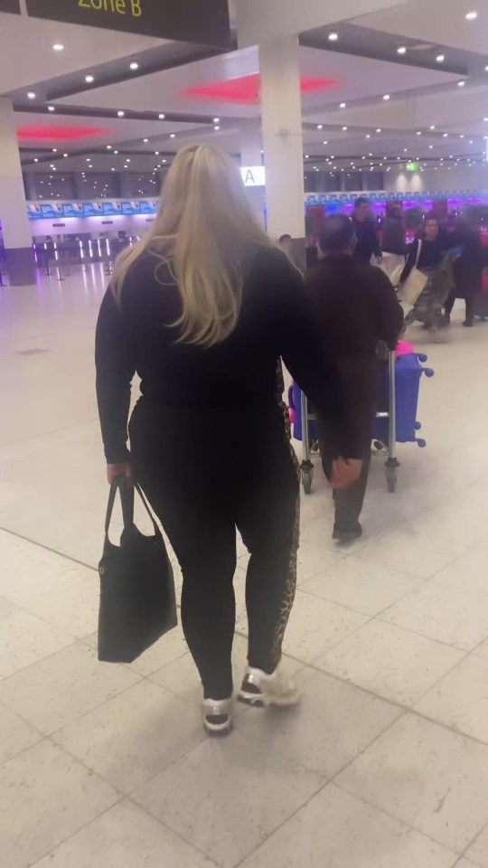 Gemma's luggage was wheeled through Heathrow Airport for her