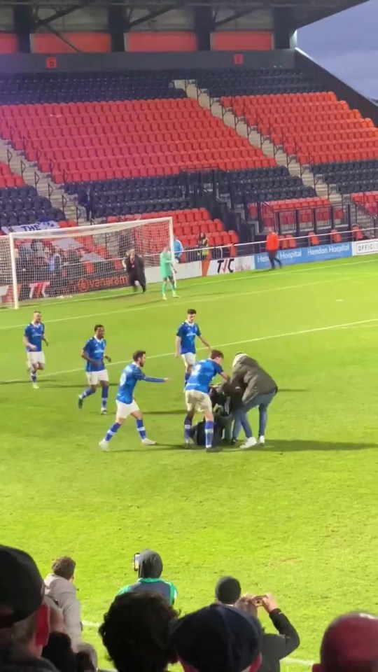 Wealdstone players quickly set about the lout as well as another fan