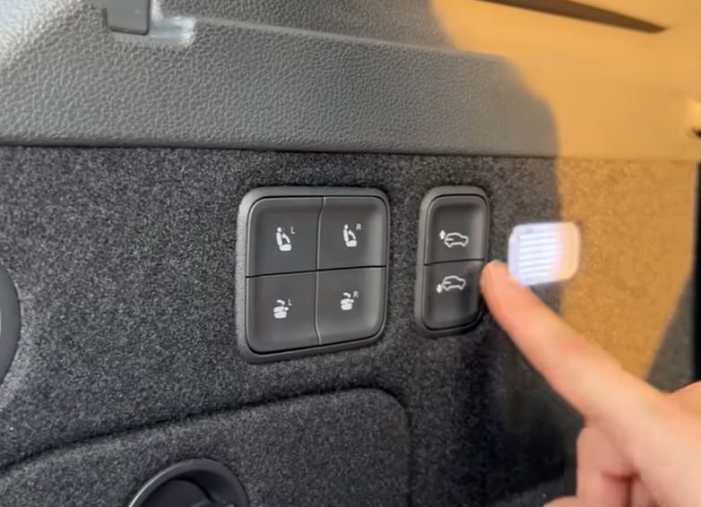 A hidden button allows you to lower and raise the suspension