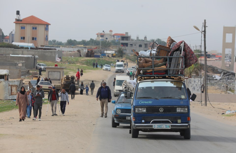 Palestinian families fleeing Rafah amid the Israeli strikes